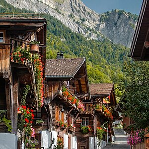 Find yourself in the charm of Switzerland with wooden houses & beautiful flowers ⁠ Some places don’t just look like a fairytale...